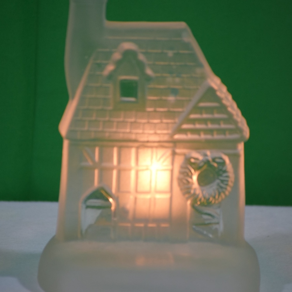 Christmas Winter Cottage Scene with candle